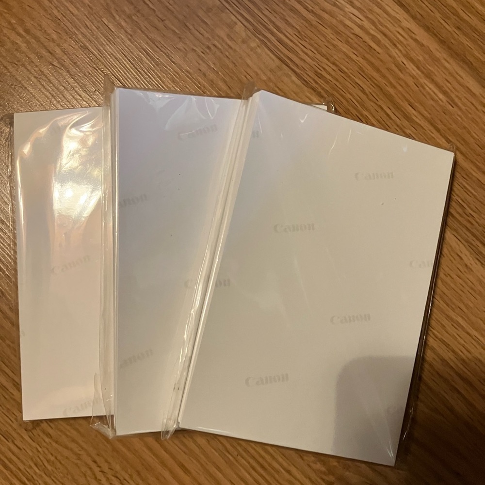 Three packages of Canon photo copy paper 4x6”